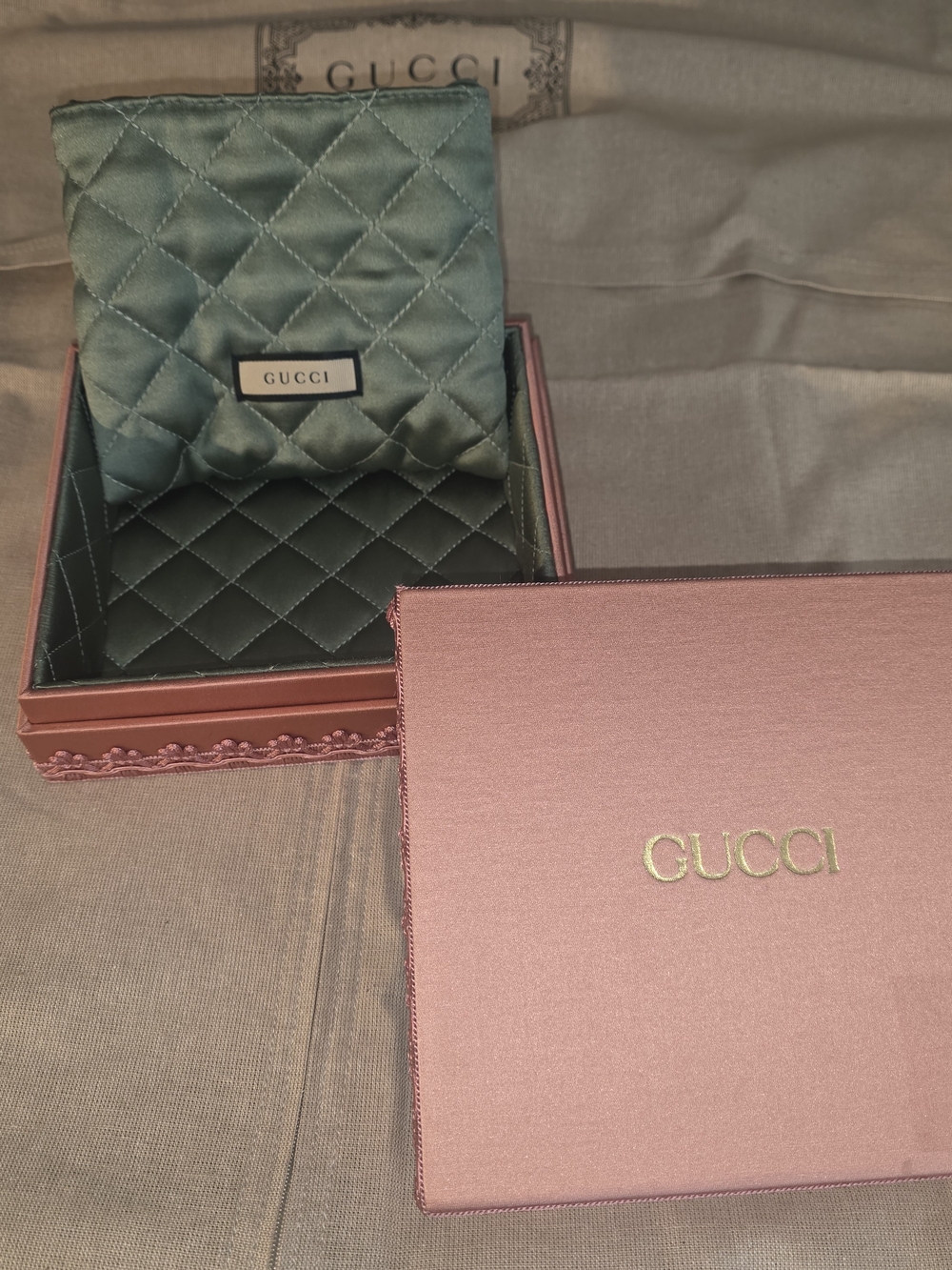 Gucci Quilted Satin Pouch in Teal with Branded Plaque